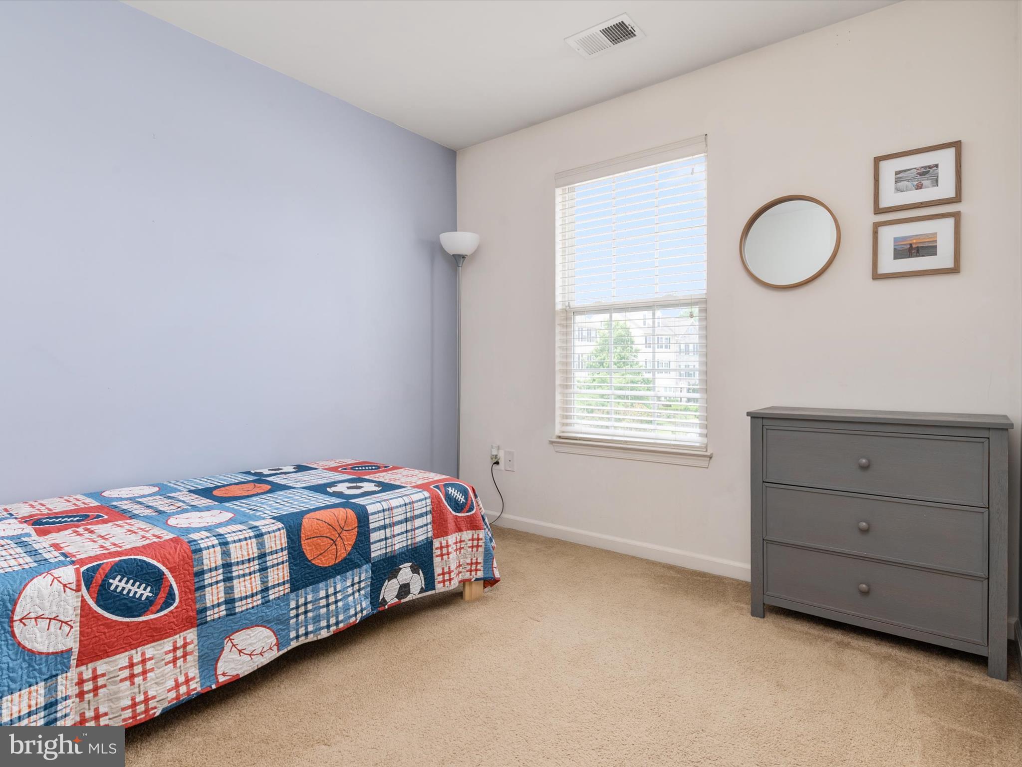 6888 Tasker Falls Elkridge, MD 21075 - Photo 34 of 47 a bedroom with a bed and a window