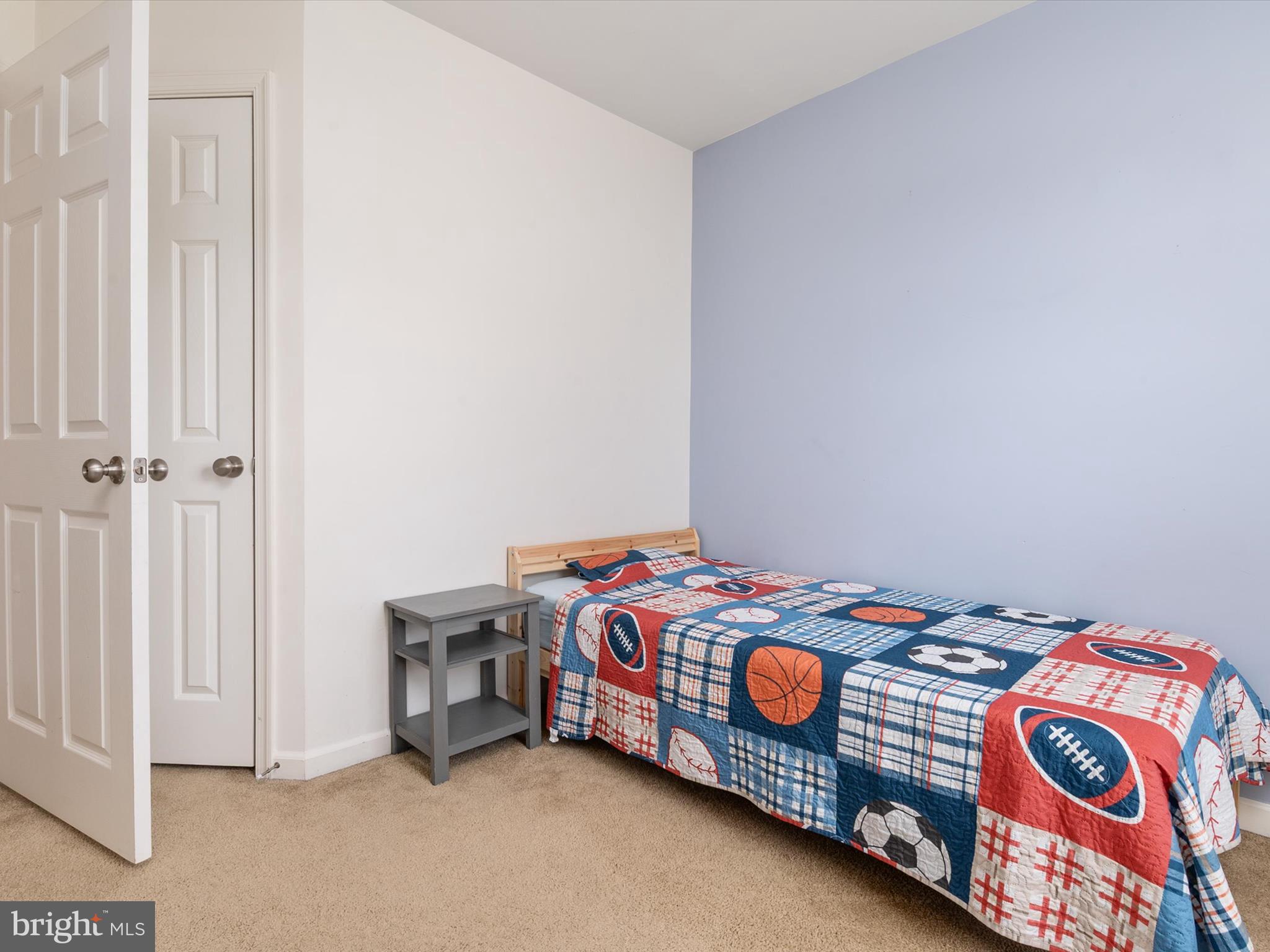 6888 Tasker Falls Elkridge, MD 21075 - Photo 35 of 47 a bedroom with a bed and a window