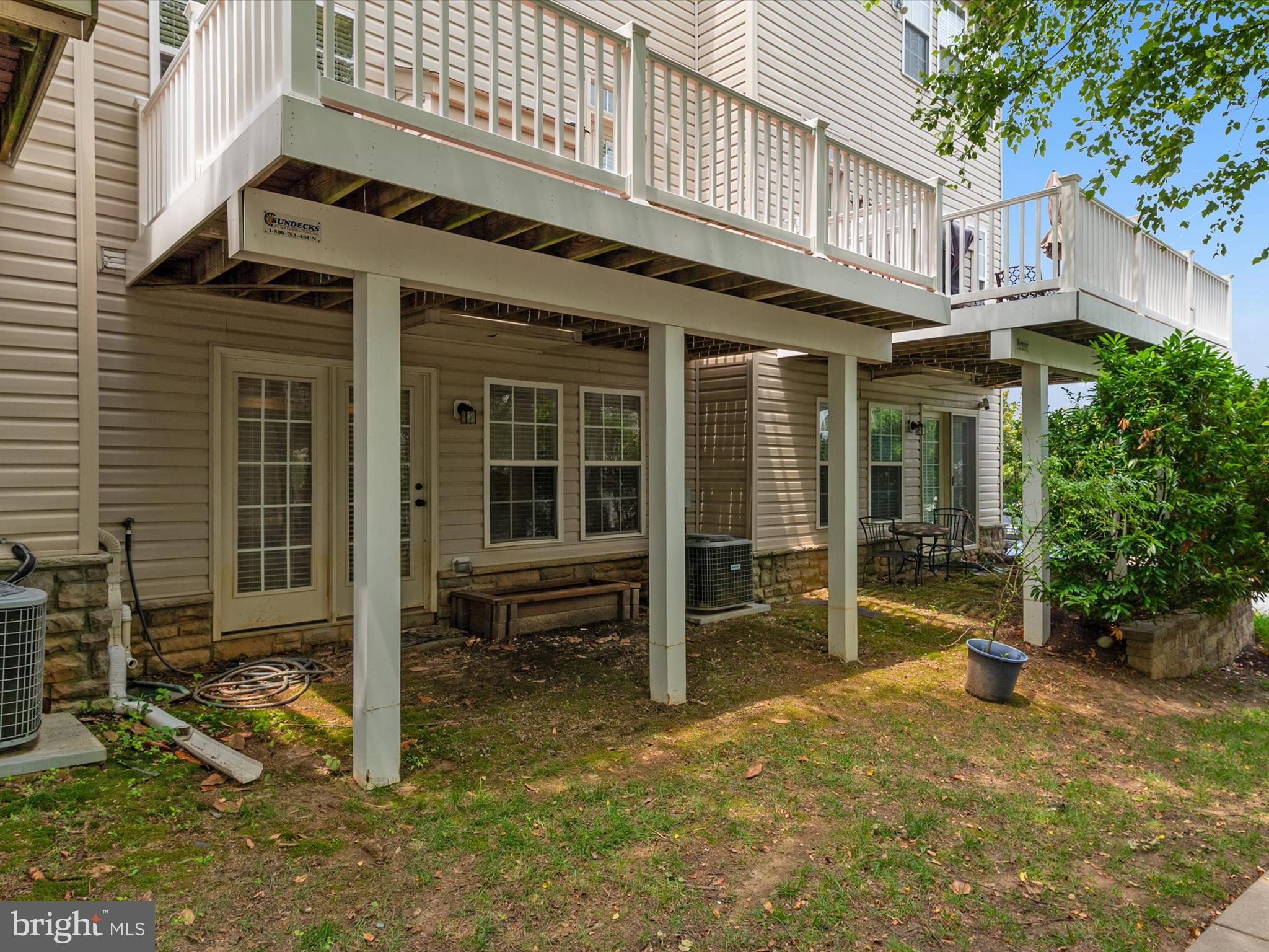6888 Tasker Falls Elkridge, MD 21075 - Photo 37 of 47 front view of a building with a porch