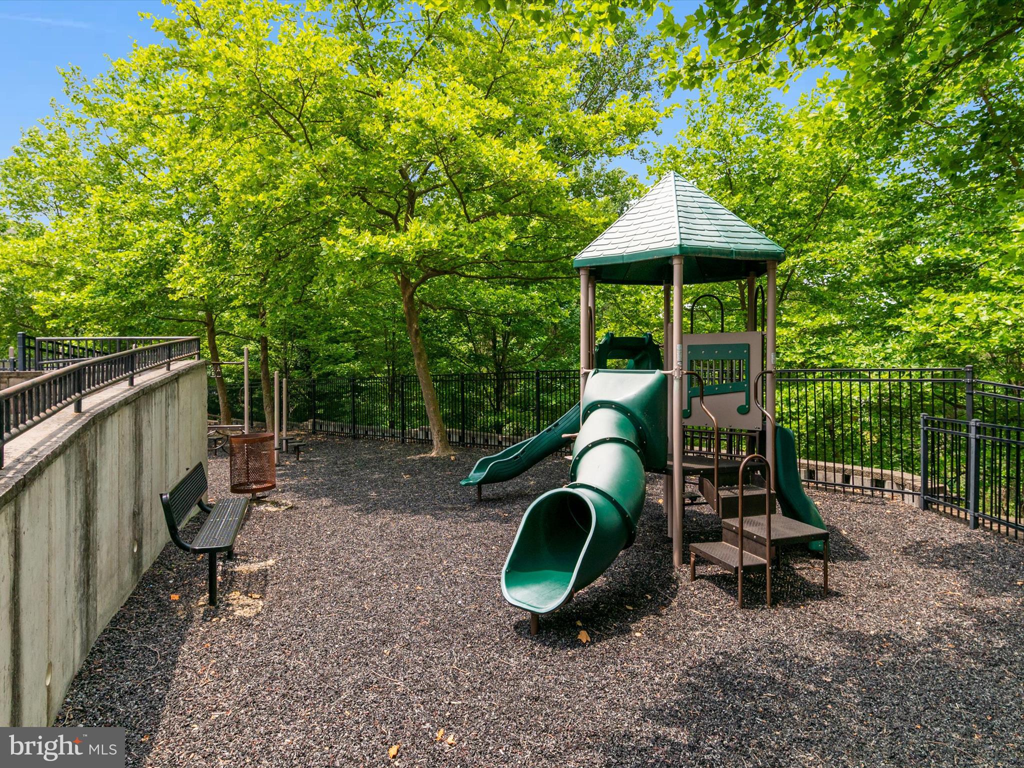 6888 Tasker Falls Elkridge, MD 21075 - Photo 46 of 47 a backyard of a house with barbeque oven table and chairs