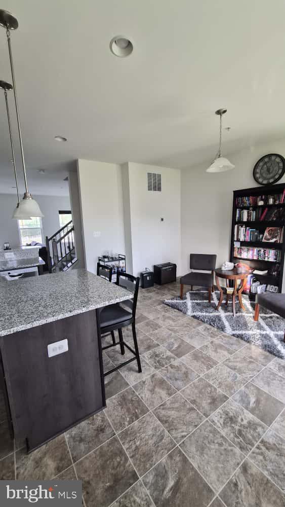 2488 Westwind Boulevard Cambridge, MD 21613 - Photo 11 of 32 a view of a workspace with furniture