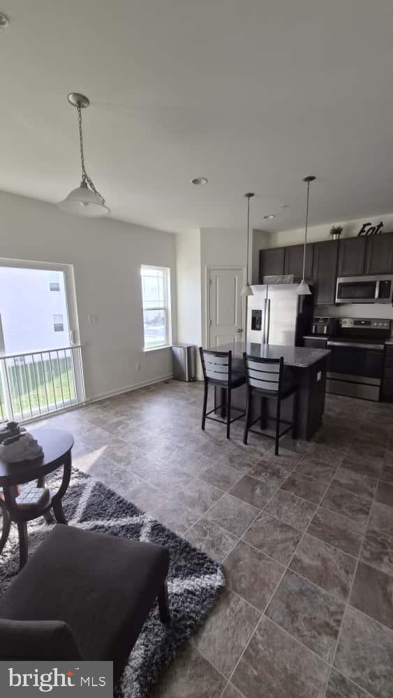 2488 Westwind Boulevard Cambridge, MD 21613 - Photo 12 of 32 a living room with furniture
