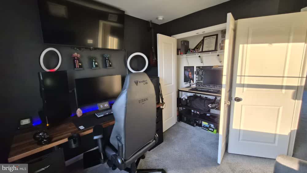 2488 Westwind Boulevard Cambridge, MD 21613 - Photo 28 of 32 a storage room with washer and dryer