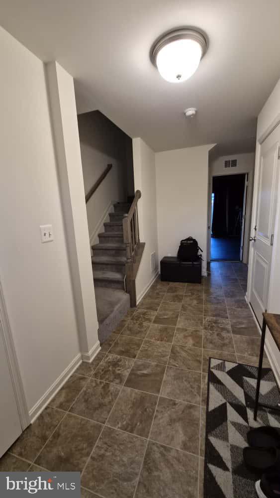 2488 Westwind Boulevard Cambridge, MD 21613 - Photo 6 of 32 view of living room with furniture and a rug