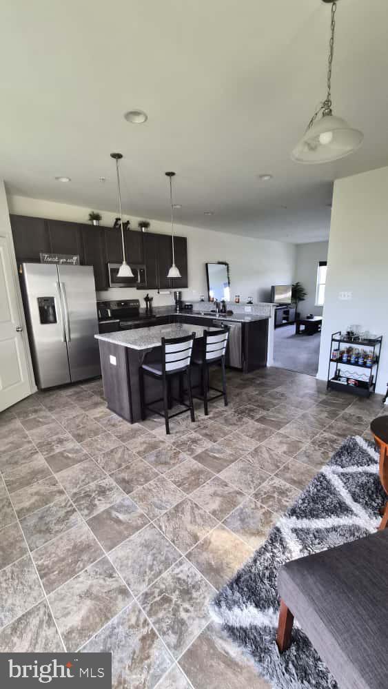2488 Westwind Boulevard Cambridge, MD 21613 - Photo 9 of 32 a living room with furniture
