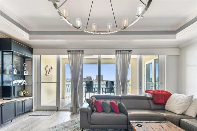 a view of an chairs and tables in the balcony