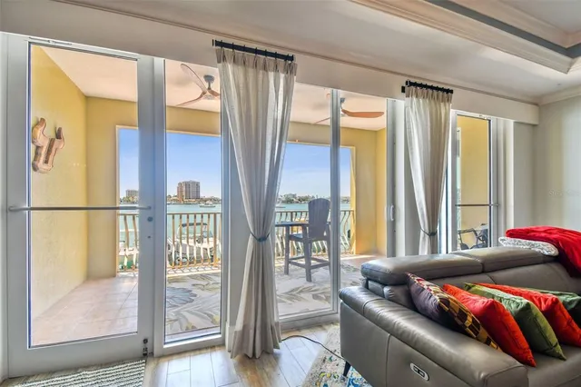 a view of a lake with houses in the back