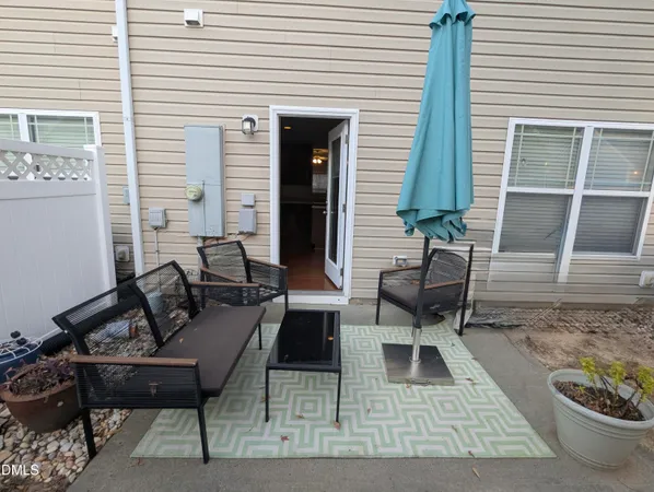 a view of a workspace with furniture