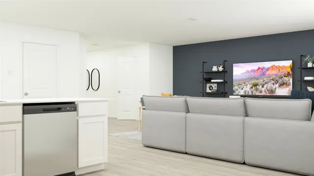 a living room with furniture and a window