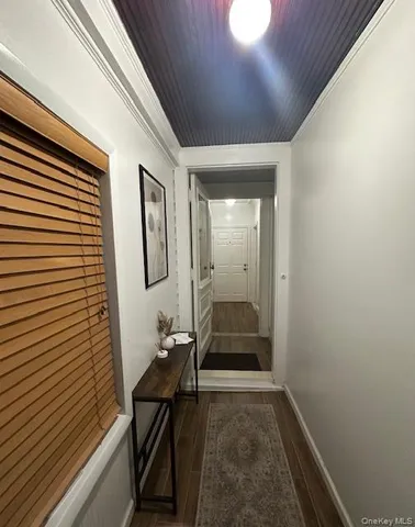 a view of a hallway with workspace