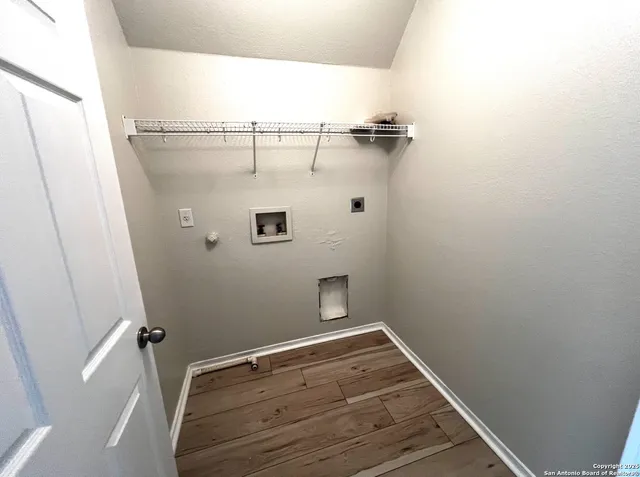 a view of a room with racks on the wall