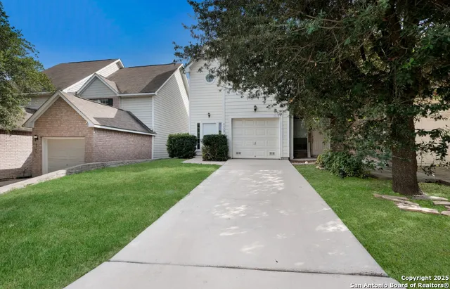 a kitchen with a stove and cabinets