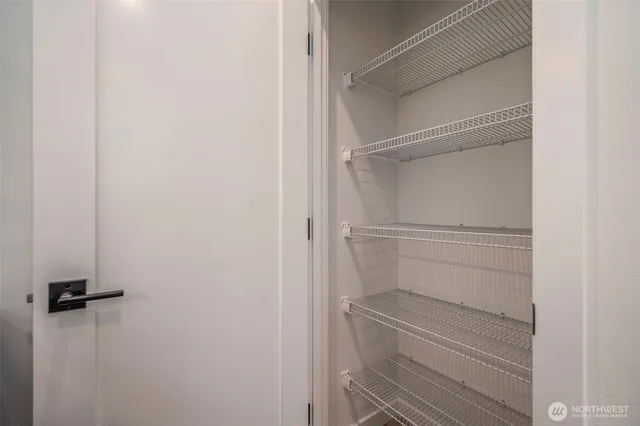 a empty closet with white paint