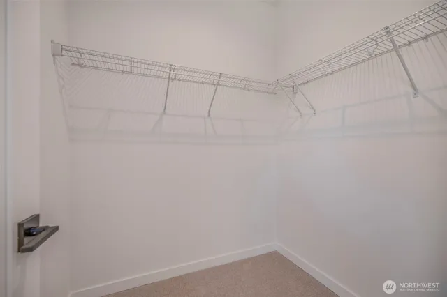 a view of a room with racks on the wall