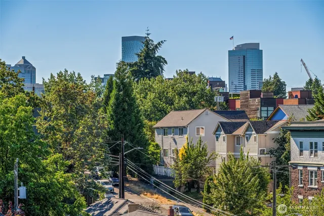 a view of a city with tall buildings