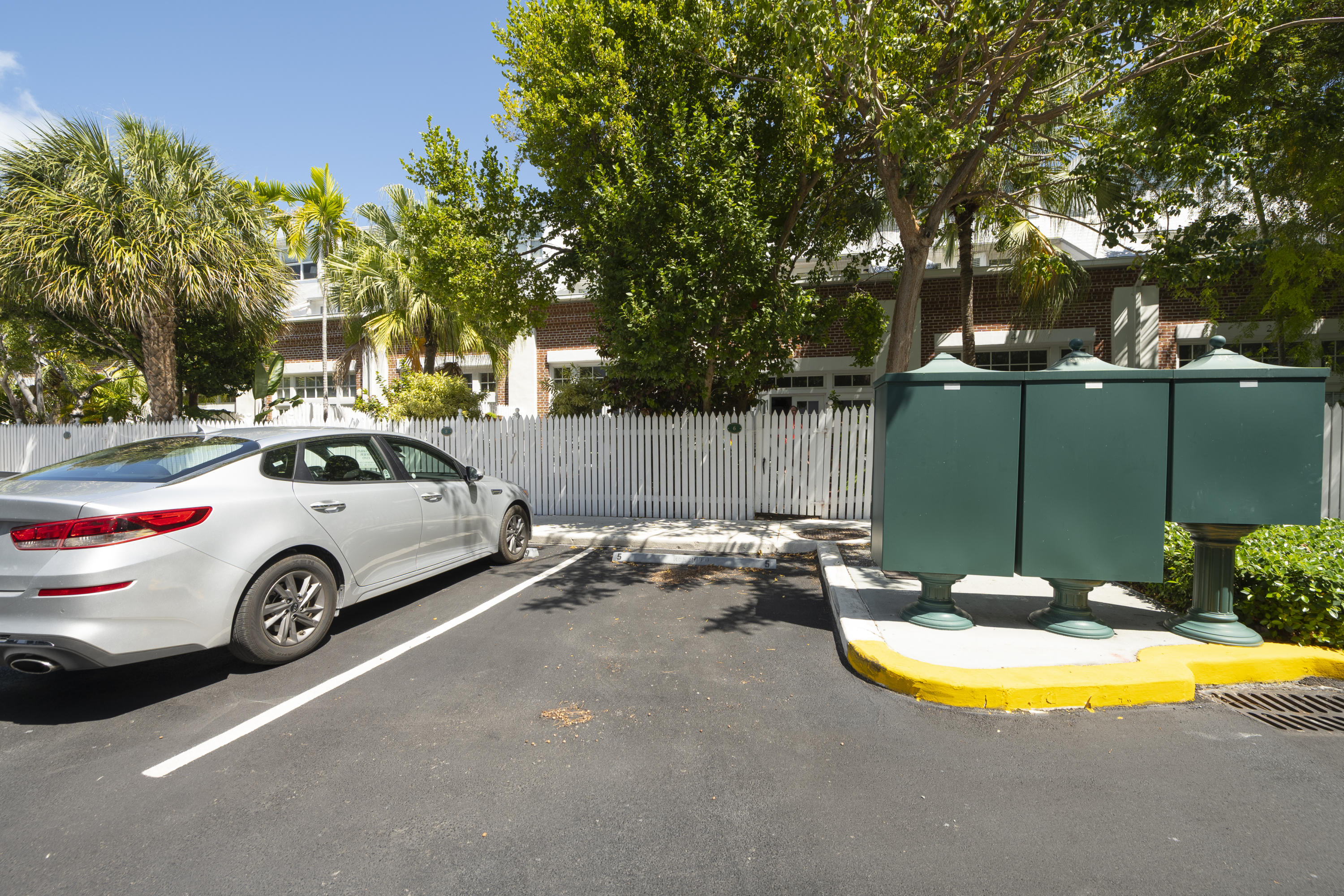 101 Front Street, Unit 5 Key West, FL 33040 - Photo 32 of 36 a view of a swimming pool with a backyard