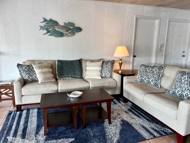 a living room with furniture and a couch