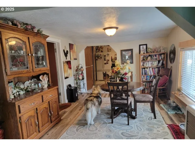 a living room with lots of furniture and a flat screen tv