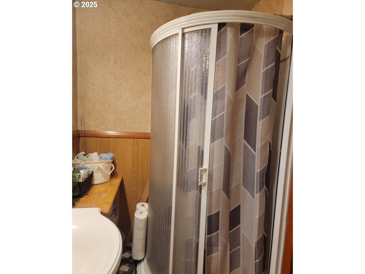 309 A Avenue Seneca, OR 97873 - Photo 21 of 35 a bathroom with a toilet and shower