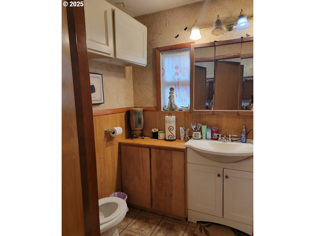 309 A Avenue Seneca, OR 97873 - Photo 22 of 35 a bathroom with a sink and a mirror