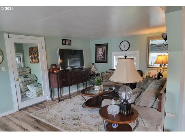 a living room with furniture and a table