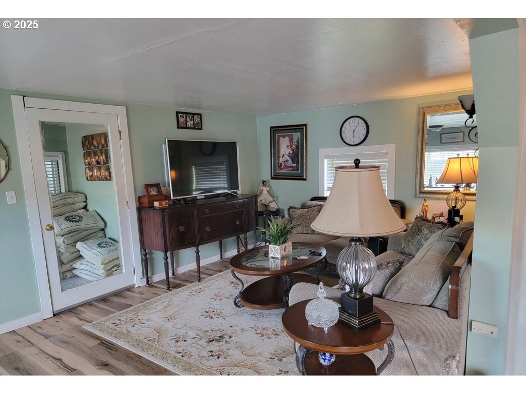 309 A Avenue Seneca, OR 97873 - Photo 8 of 35 a living room with furniture and a table