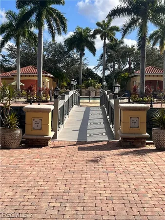 a view of a yard with palm trees