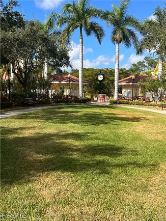 a view of a large swimming pool and an outdoor space