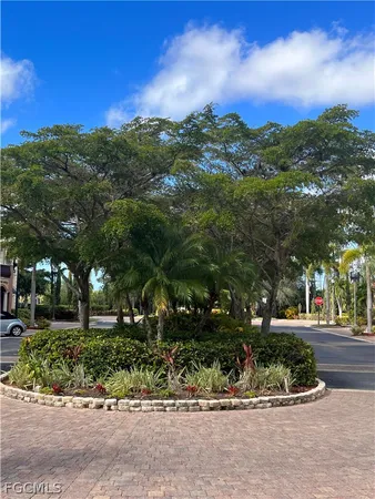 a view of a road with a building in the background