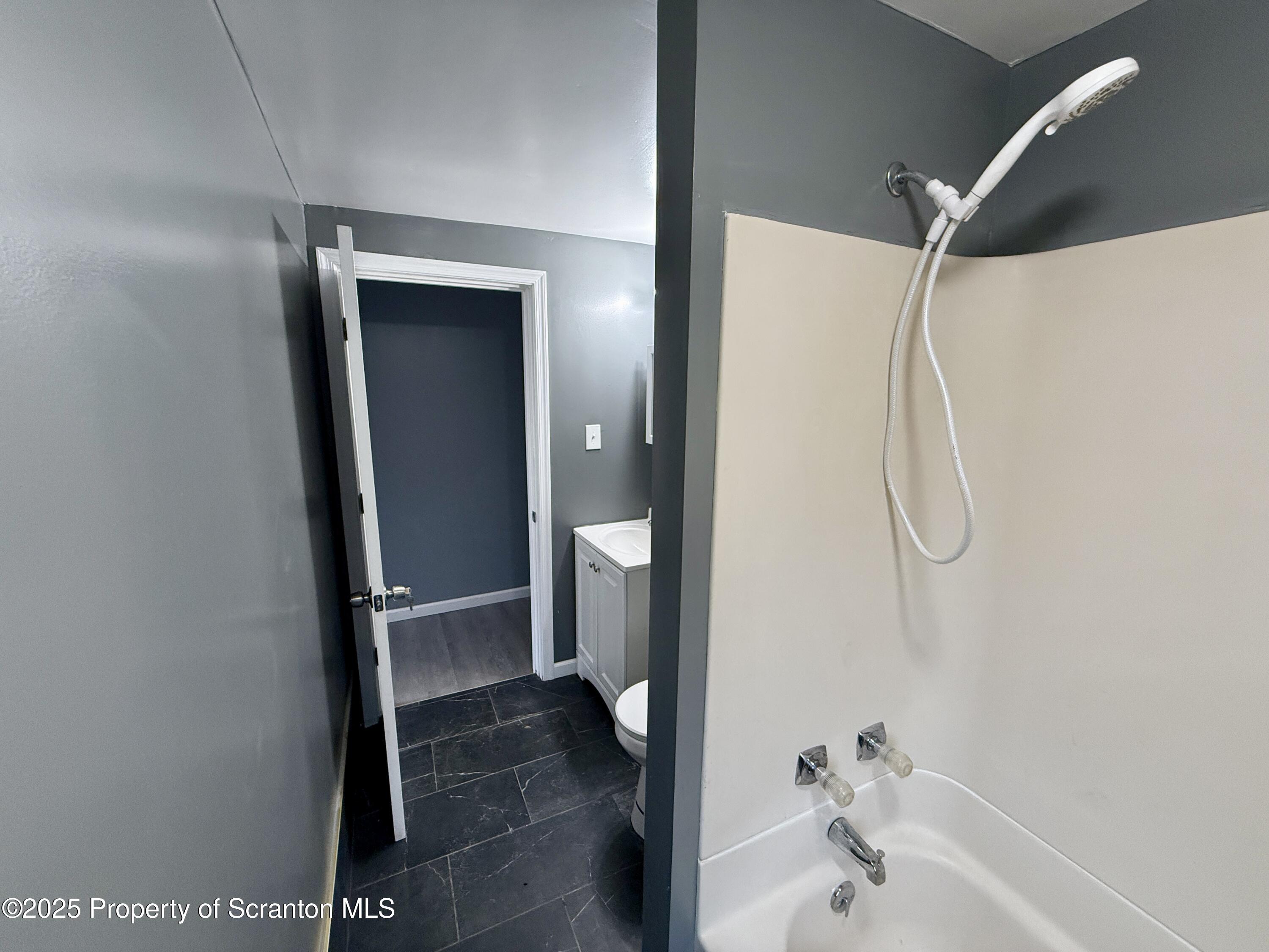 112 Mowry Road Meshoppen, PA 18630 - Photo 21 of 30 a bathroom with a glass shower door