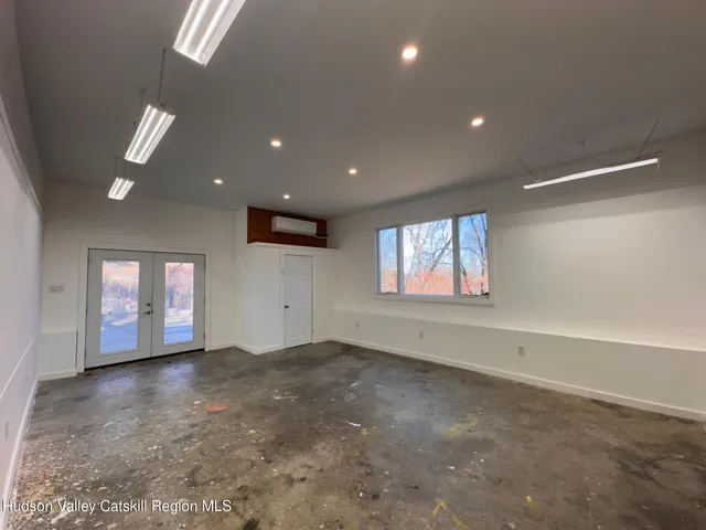 an empty room with windows