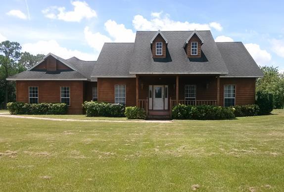 11785 Willis Road Fort Pierce, FL 34945 - Photo 1 of 10 Front