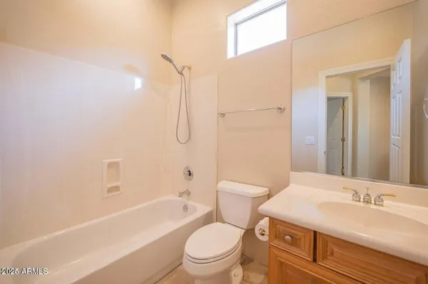 a bathroom with a sink a toilet and a bathtub