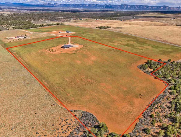 a view of a swimming pool and an outdoor space