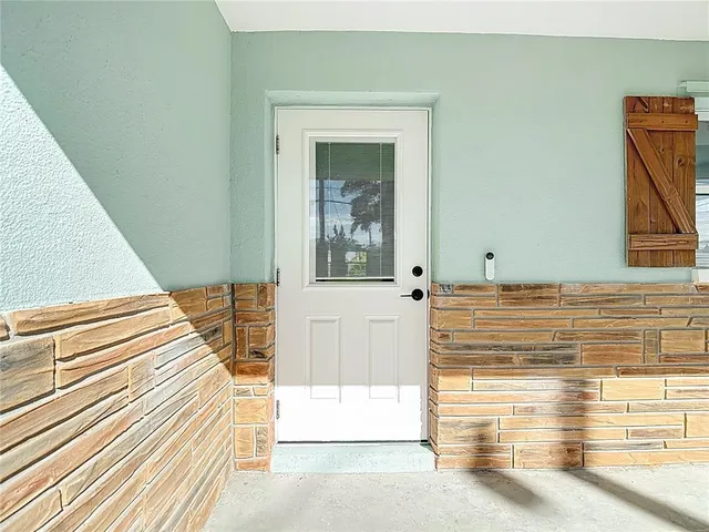 a view of a entryway door of the house