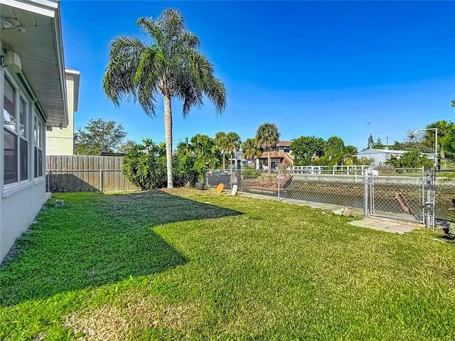 a view of a garden with a lake