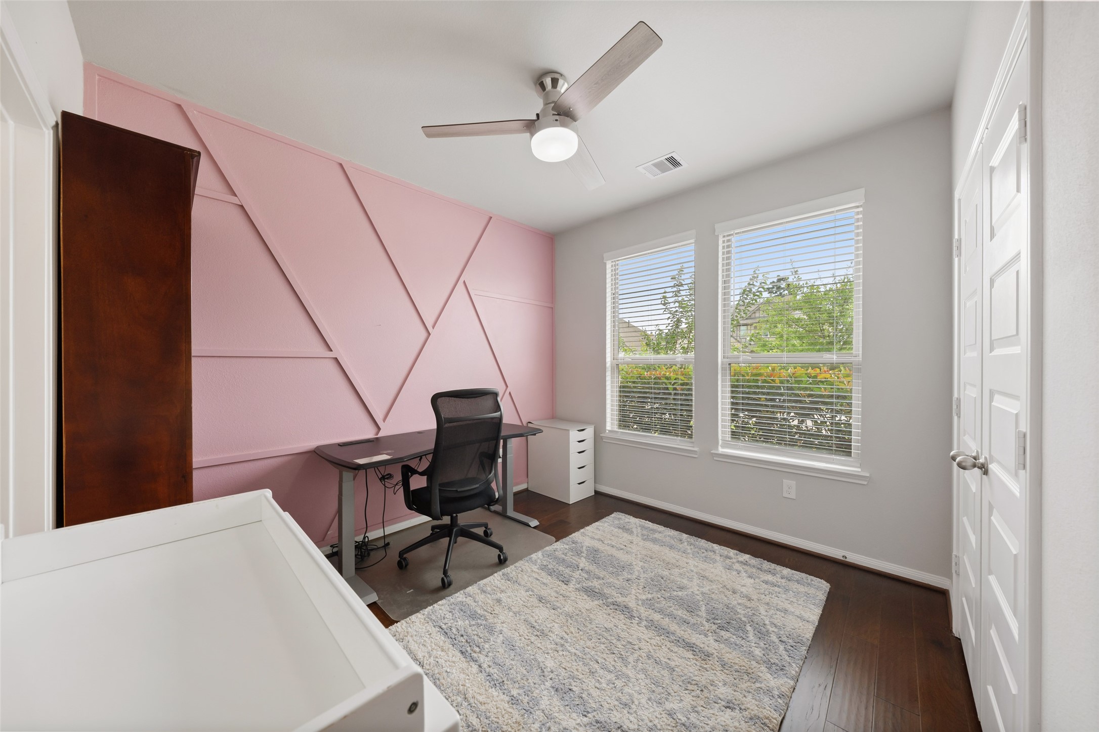 17323 Grand Canyon Road Conroe, TX 77302 - Photo 19 of 33 Second bedroom down, used here as an office, has a private ensuite bath.