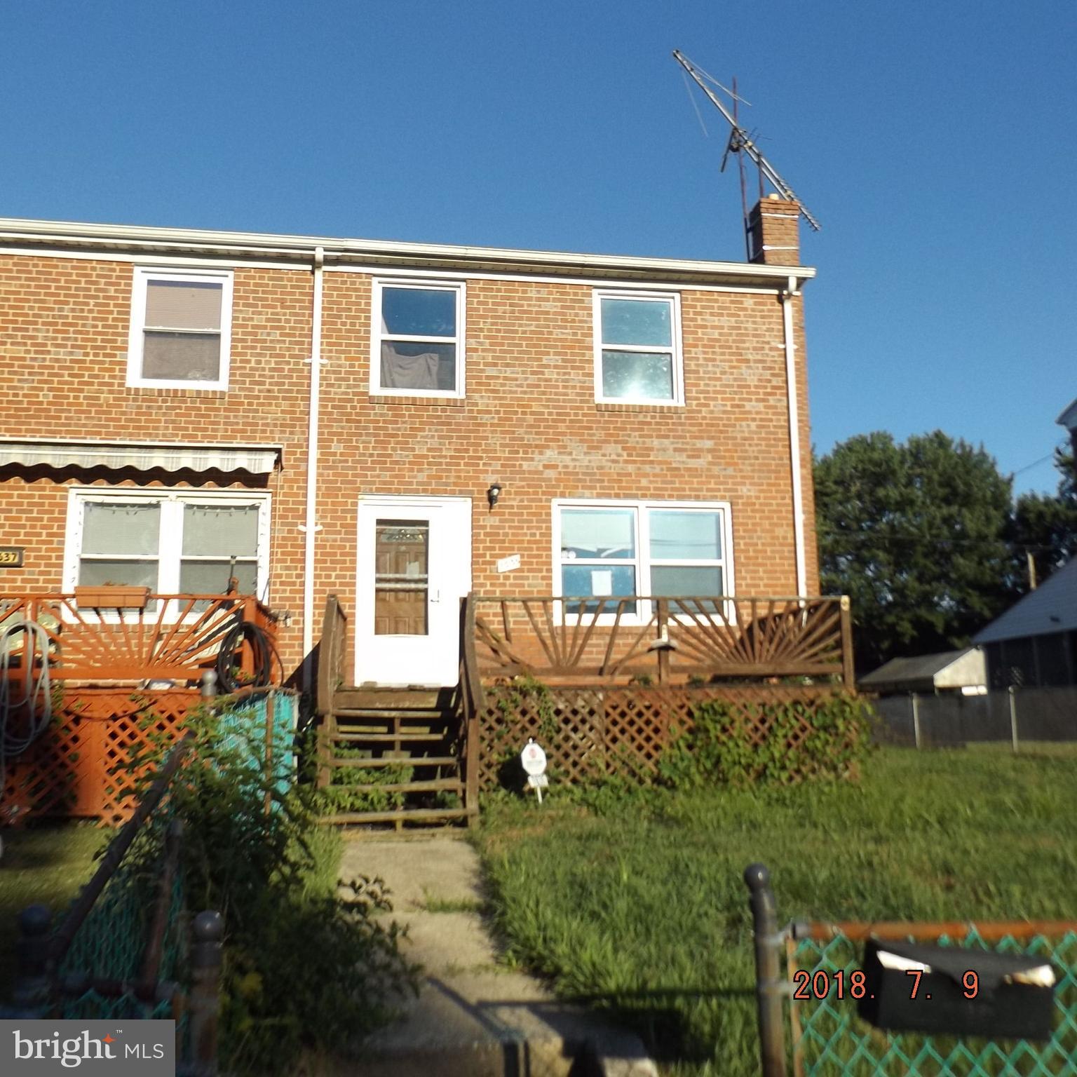 1635 Riverwood Road Baltimore, MD 21221 - Photo 1 of 30 front view of house with a yard