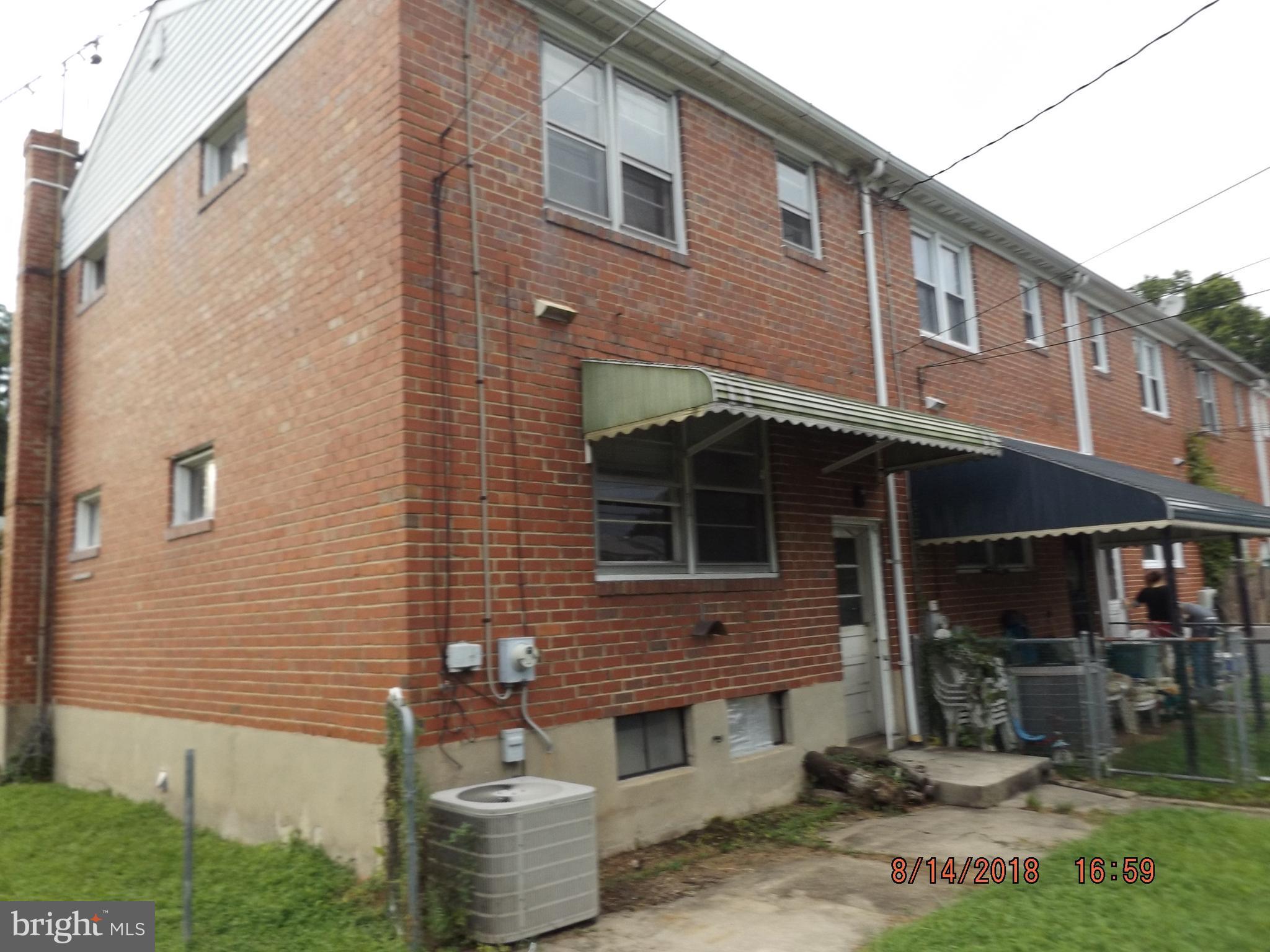 1635 Riverwood Road Baltimore, MD 21221 - Photo 2 of 30 a front view of a house with a yard