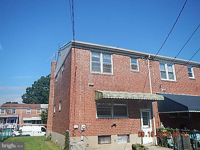 1635 Riverwood Road Baltimore, MD 21221 - Photo 3 of 30 a front view of a house with a garden
