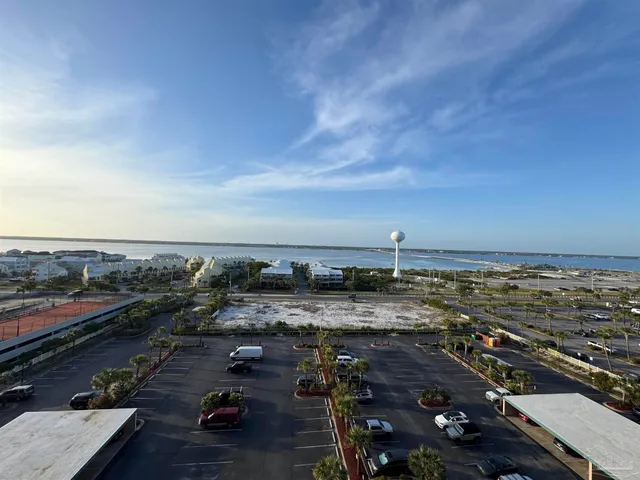 a view of a parking area with an ocean view