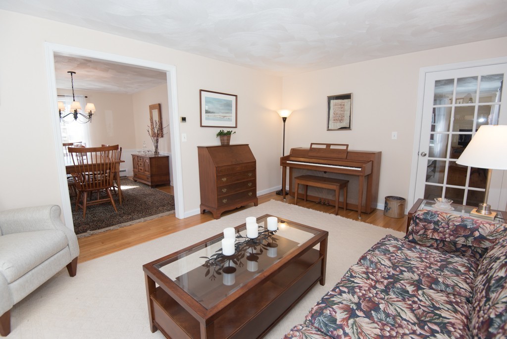 35 Acorn Road Northbridge, MA 01588 - Photo 12 of 23 a living room with furniture a couch and dresser