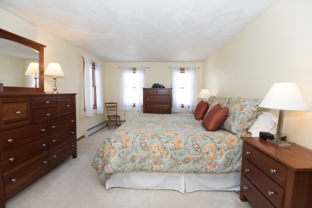 35 Acorn Road Northbridge, MA 01588 - Photo 14 of 23 a bed room with a bed and a lamp
