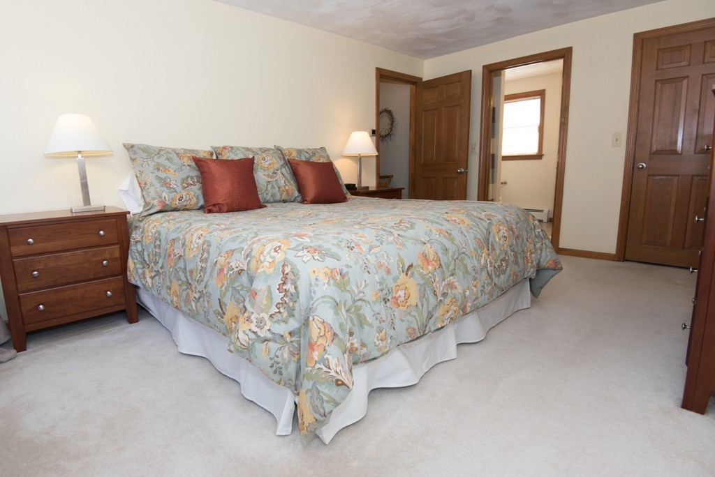 35 Acorn Road Northbridge, MA 01588 - Photo 15 of 23 a spacious bedroom with a bed and a night stand