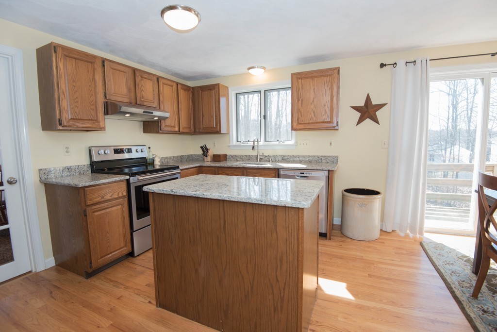 35 Acorn Road Northbridge, MA 01588 - Photo 4 of 23 a kitchen with stainless steel appliances granite countertop a sink stove and refrigerator