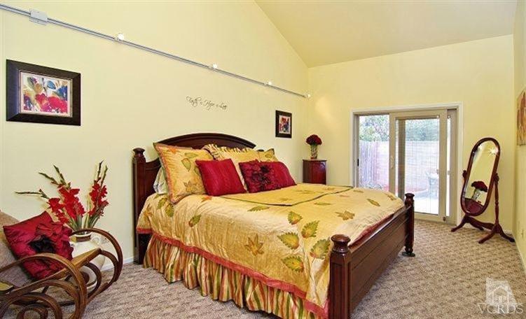 2921 Fanshell Walk Oxnard, CA 93035 - Photo 7 of 20 a bedroom with bed and a mirror