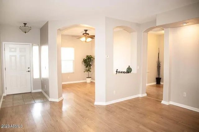 a view of entryway with wooden floor