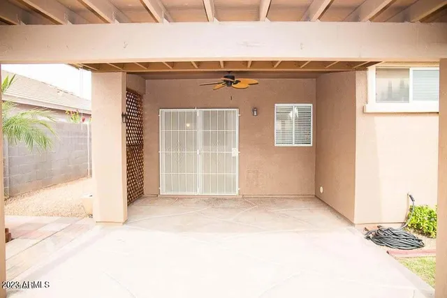 a view of a backyard with a garden and plants