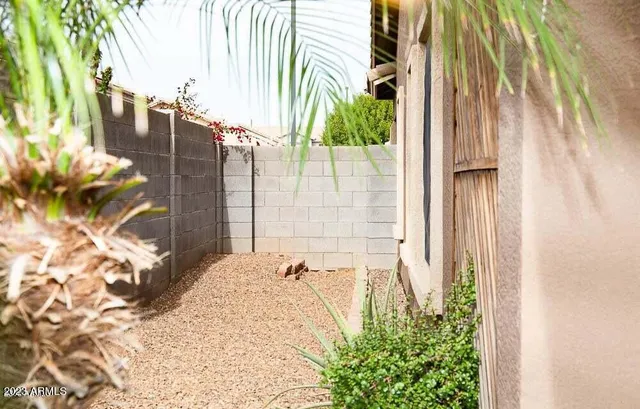 a view of a backyard with a garden