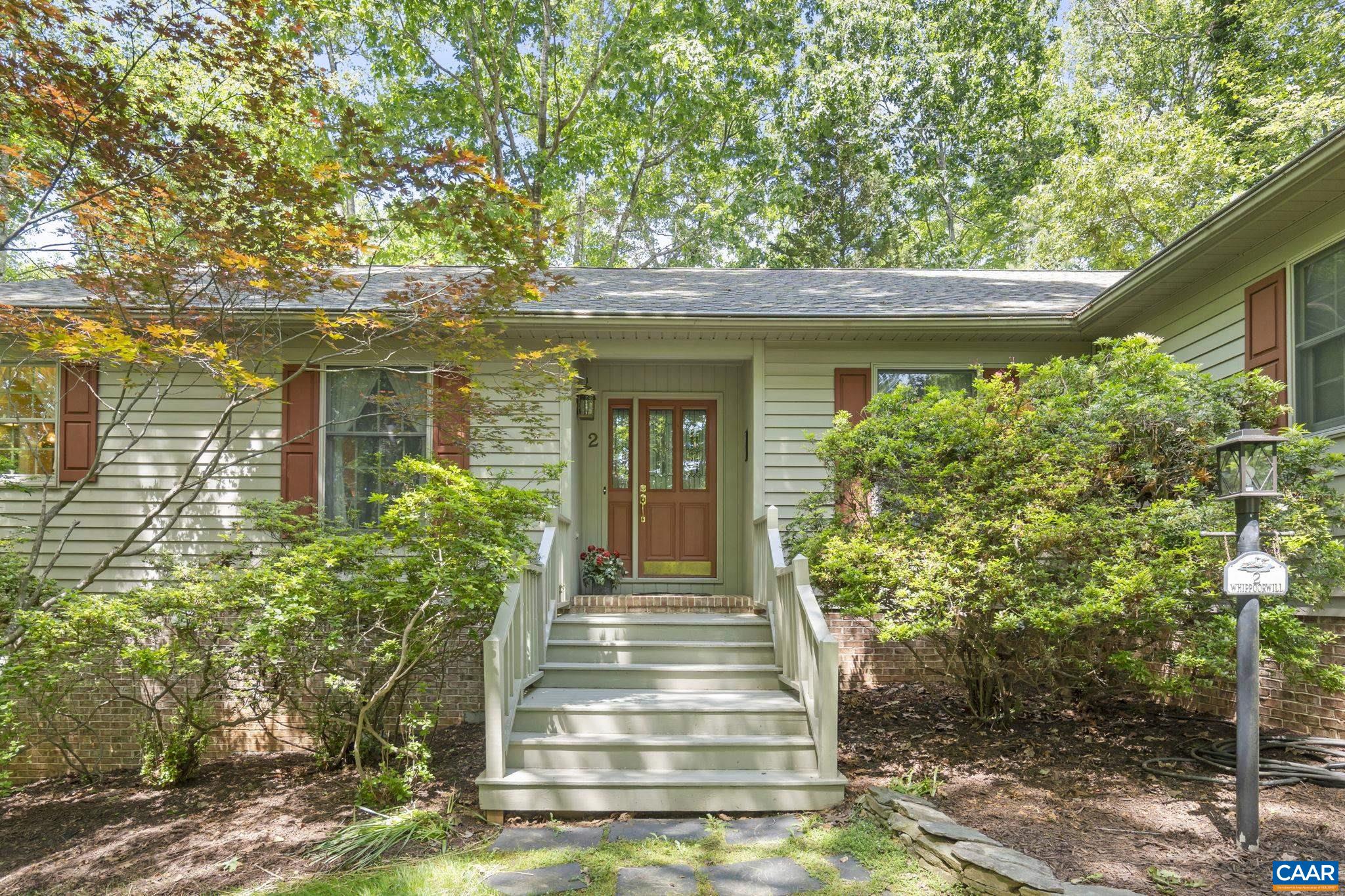 2 Whippoorwill Lane Palmyra, VA 22963 - Photo 2 of 36 a front view of a house with a garden